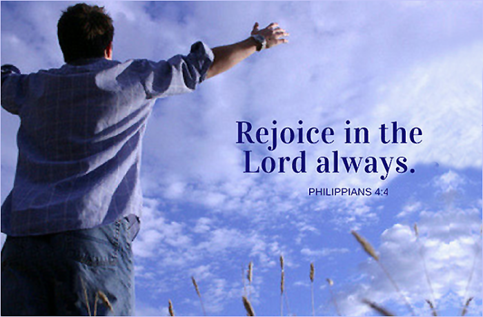 A person with arms raised in joy against a blue sky, with the text 'Rejoice in the Lord always. PHILIPPIANS 4:4' overlaid.