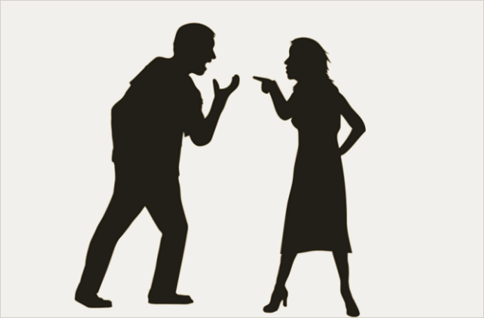 Silhouettes of a man and a woman engaged in a heated argument, with the man shouting and the woman pointing.
